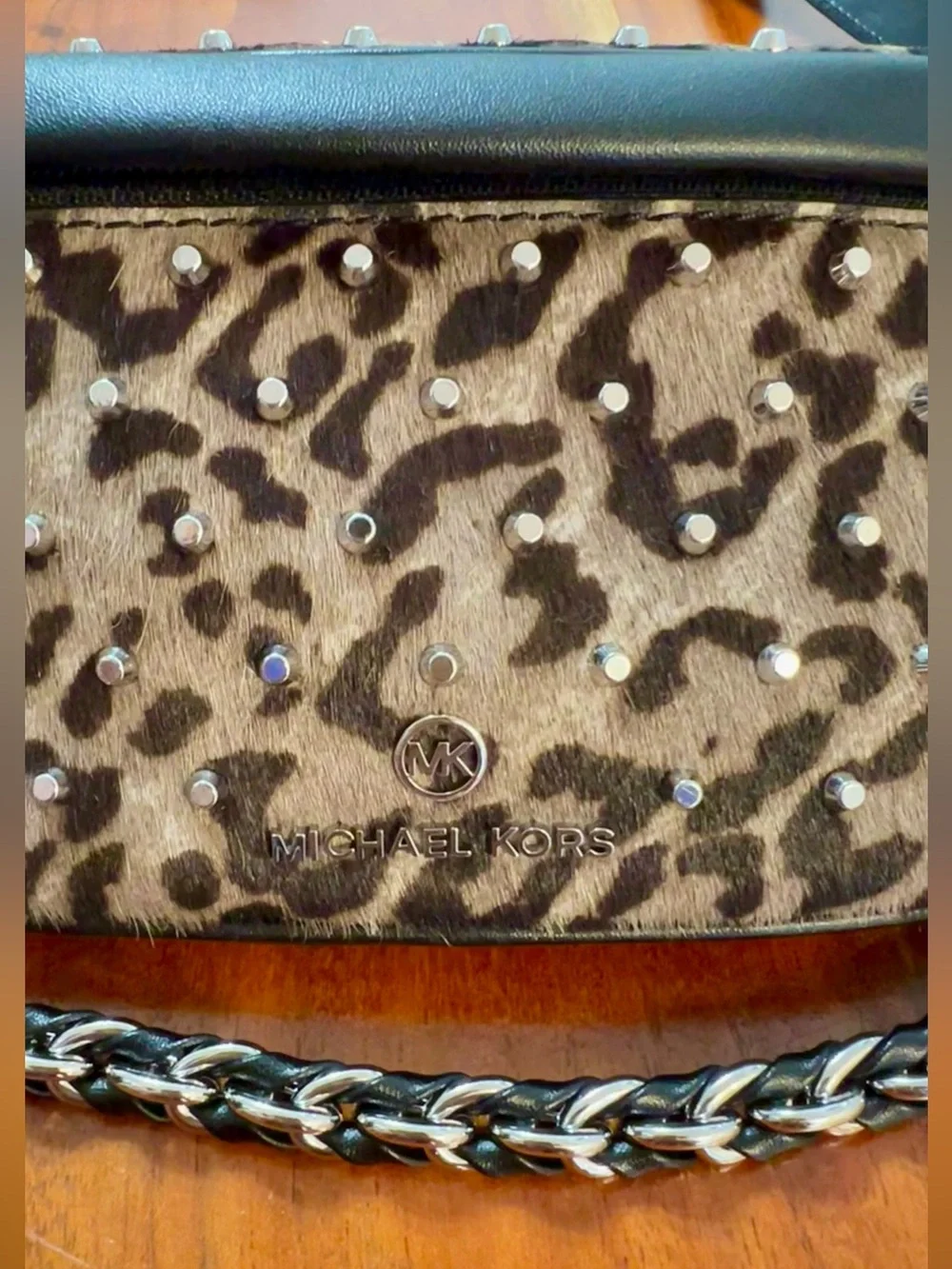 Michael Kors animal print calf hair cross body adjustable Sling Pack